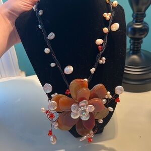 Stunning leather and lucite necklace with gorgeous flowers. Choker length!